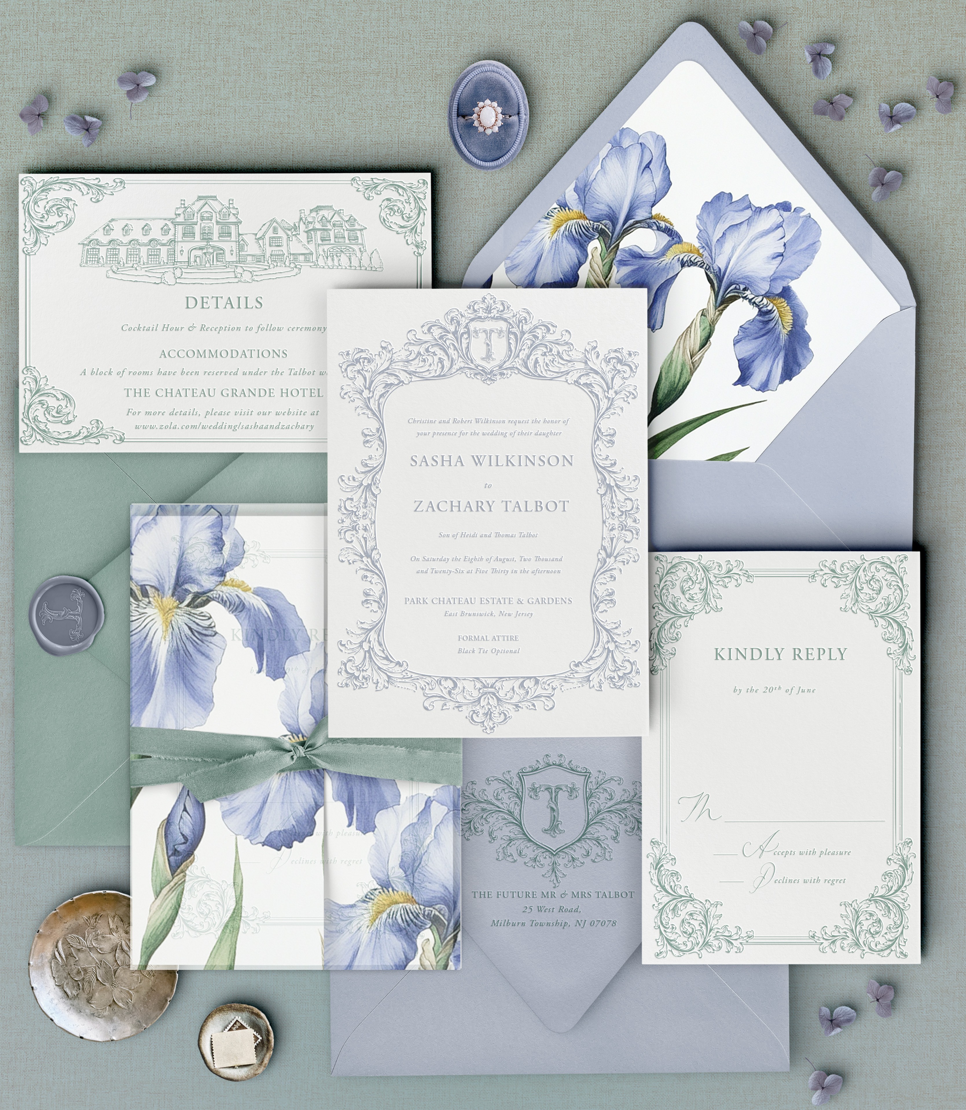 Wedding invitation suite with floral designs, envelope, and decorative elements on a light background.