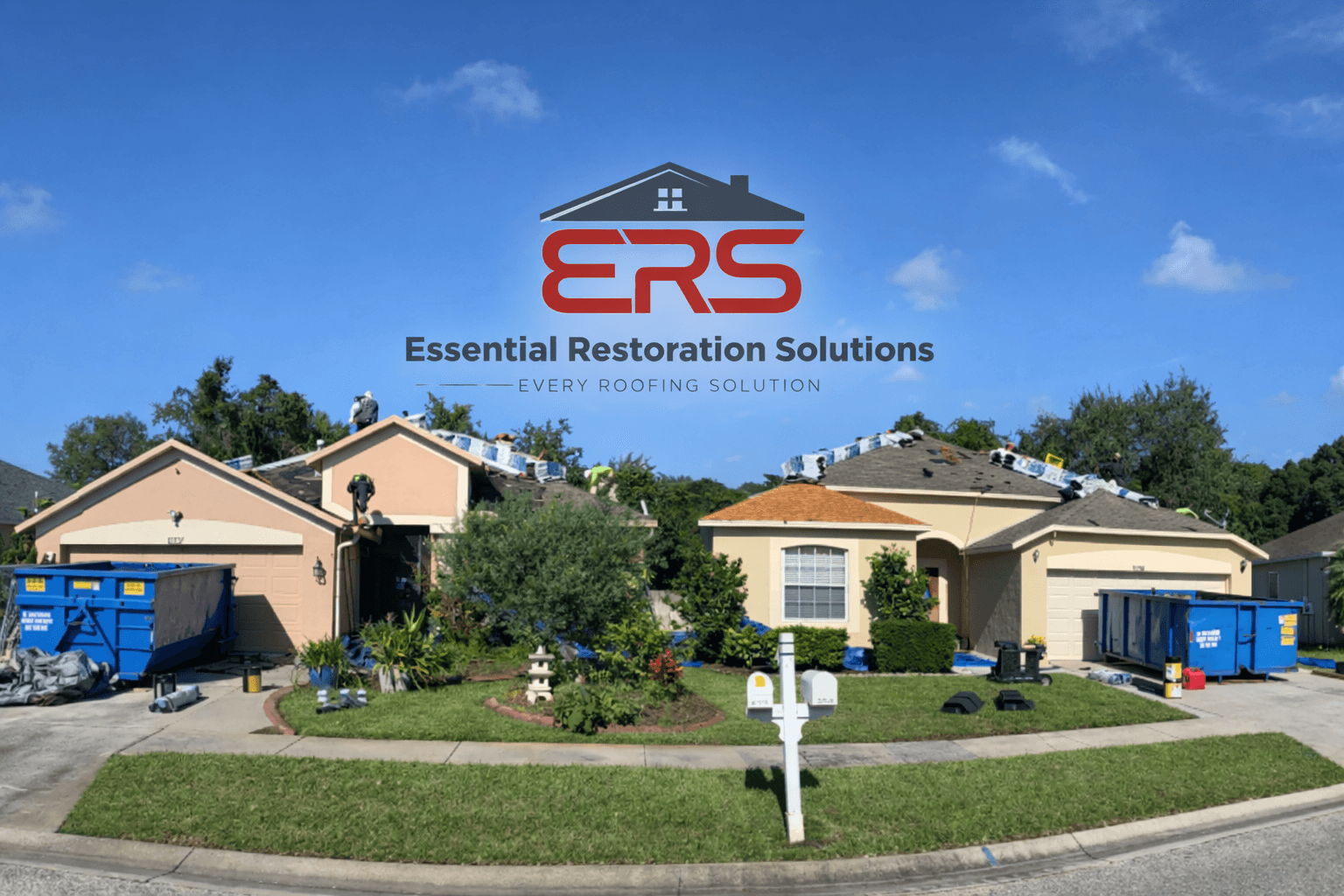Residential neighborhood with houses, trees, and a clear blue sky, featuring a company logo for Essential Restoration Solutions.