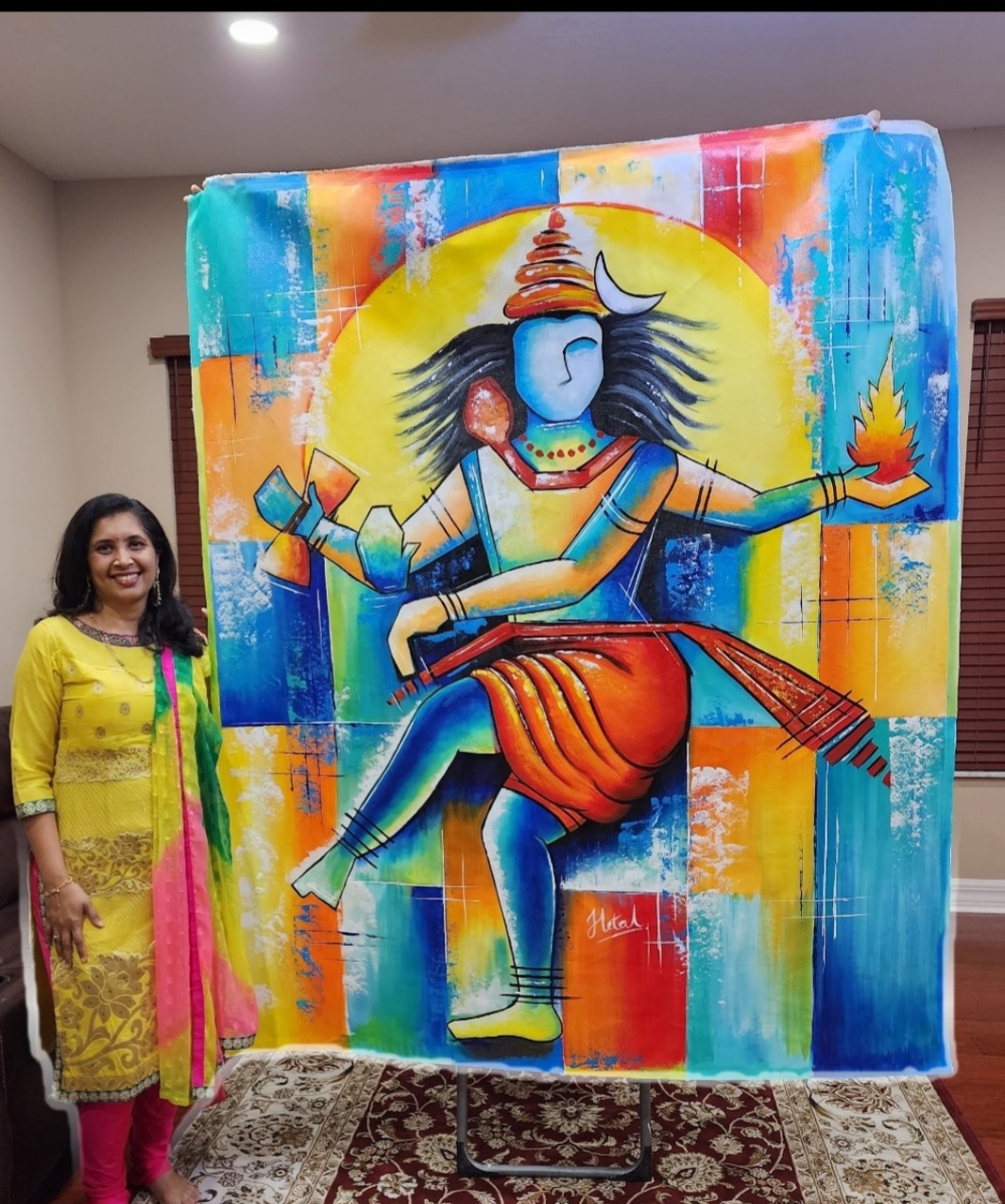 Woman standing next to a colorful painting of a blue deity with multiple arms, holding a flame and a bow, on a vibrant background.
